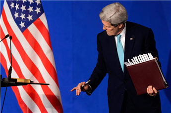 Secretary of State John Kerry leaves the stage at the Swiss Federal Institute of Technology in Lausanne, Switzerland, on April 2, 2015.  AP